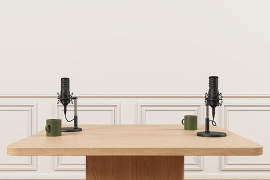 Contemporary podcast studio setup with microphones and mugs on wooden table in elegant interior with white panel walls. 3D Rendering