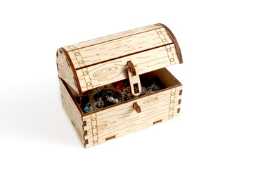 There is a souvenir chest with jewelry on a white background.