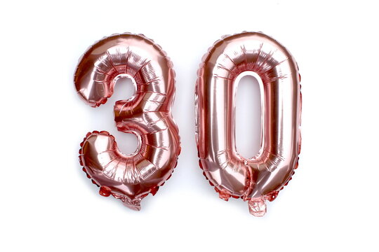 Blown pink number balloons for birthday.