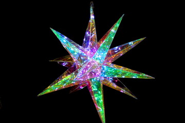 Decorative star with glowing garlands.
