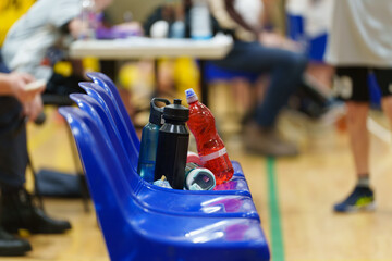 athletes drinking water bottles