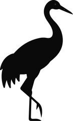 Obraz premium Silhouette of a crane standing on one leg