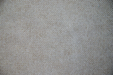 Fototapeta premium The texture of the beige burlap fabric. Natural fabric. Background.