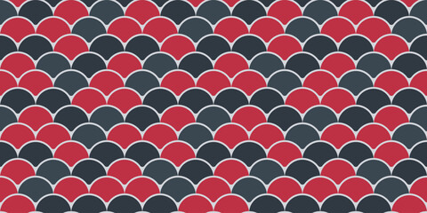 Abstract seamless pattern with overlapping red and dark gray semicircles, creating a fish scale or wavelike effect.  Perfect for textile design, website backgrounds, or decorative art projects. © Olena