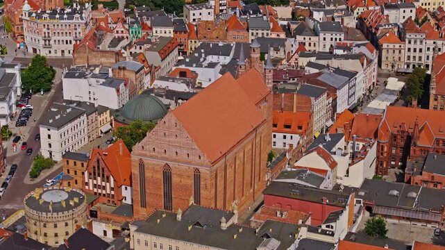 Drone shows Kości&oacute;ł Wniebowzięcia NMP Church standing tall in Torun Poland