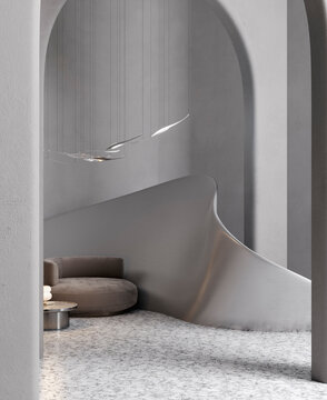 Modern minimalist reception area with armchair and curved wall