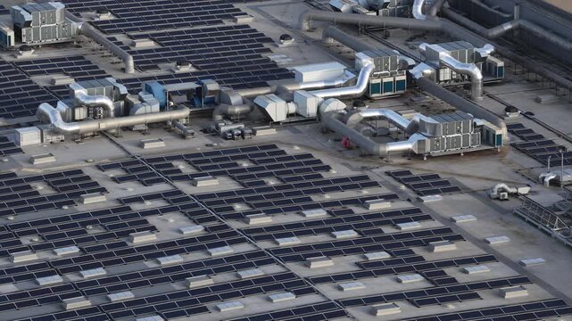 Renewable energy. Solar panels on warehouses rooftops. Decentralized energy