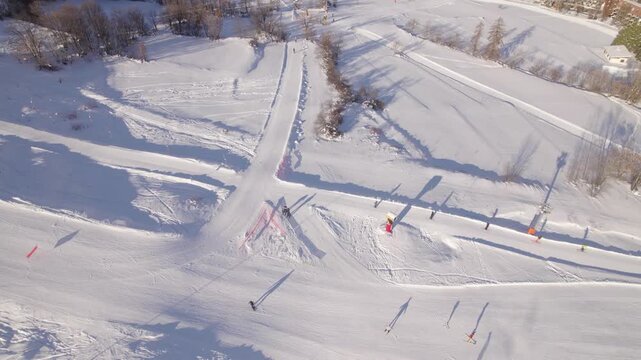 Beginner Terrain Park with Snow Features and Learners, La Salle-les-Alpes Serre Chevalier - Aerial Drone Shot