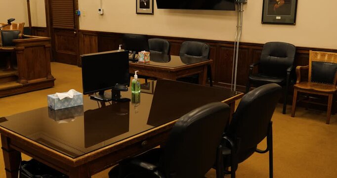 Lawyer's tables, defense and procecution in courtroom