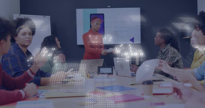 Presenter gesturing at phone mockup handing docs reviewing app design dotted overlay showing