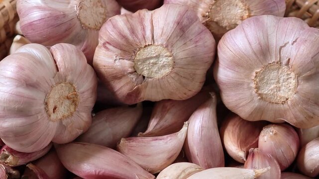 Fresh garlic in a basket.	