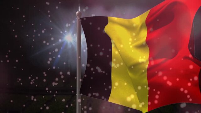 Tricolored flag catching gust and billowing, rippling folds traveling across fabric with lens flare