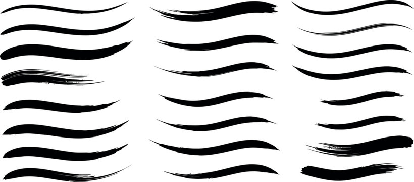 Collection of black brush stroke underlines and swooshes isolated on white background, perfect for emphasizing text or adding graphic flair.