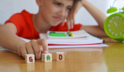 GAD. mental health concepts. preteen boy frustrated doing homework, importance of educational needs and special attention to this problem. © Inspiraciones