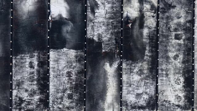 Aerial top view of traditional salt mining fields industry in Vietnam.