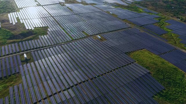 Aerial view Big farm of solar panels installed in field, innovation ecology energy generator.