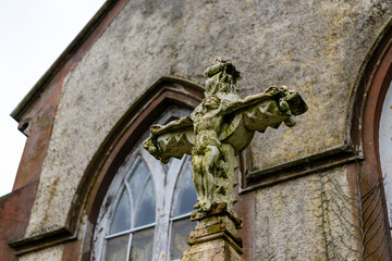 Obraz premium Crucifix outside a derelict Roman Catholic church