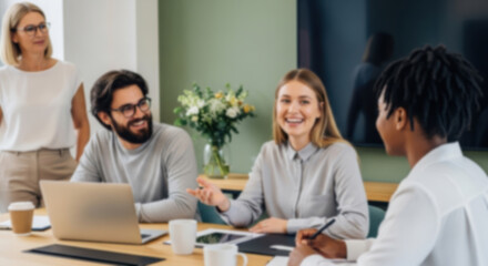 Fototapeta premium soft focus blurred photo of Diverse Business Team Collaborating in Modern Office Meeting