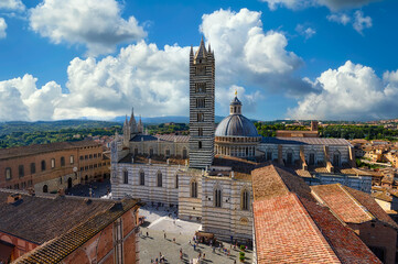 Naklejka premium Aerial view of Siena Cathedral Santa Maria Assunta (Duomo di Siena) and Piazza del Duomo in Siena, Italy. Skyline of Siena.