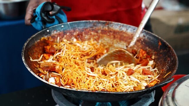 Street Vendor Stir Frying Mee Sotong Noodles in Wok