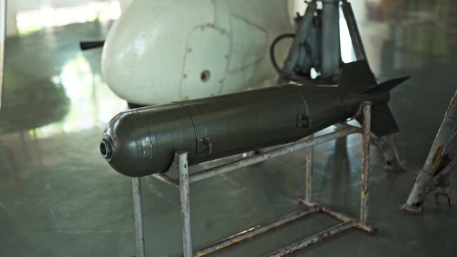 Military bombs standing on the base in the stands of the air-to-ground system. Rocket technology.