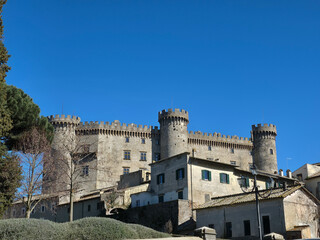 Fototapeta premium Majestic Orsini-Odescalchi Castle in Bracciano under Clear Blue Sky, 15th Century Renaissance Fortress in Lazio, Italy