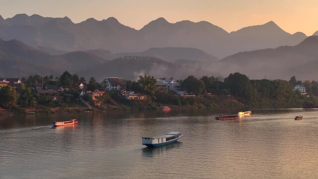 Aerial view of heritage city of Luang Prabang and Mekong river landscape at sunset Time in Laos, Asia. Lao Republic.