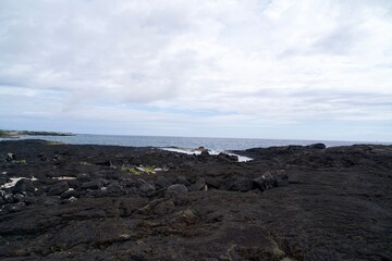 Lava coast, sea, and cloudscapes of Hawaii Island