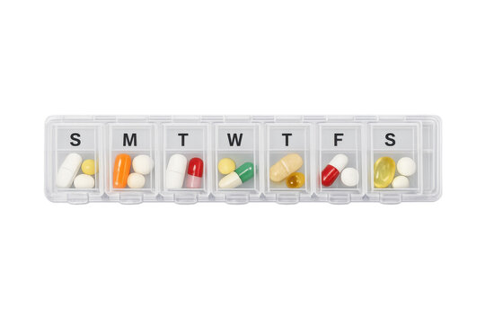 Weekly pill organizer with medication on transparent background