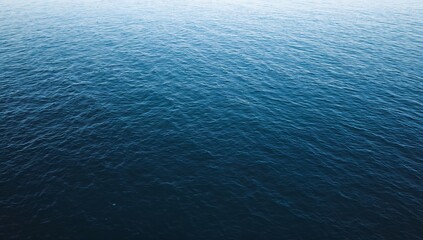 Obraz premium Calm and peaceful deep blue ocean surface