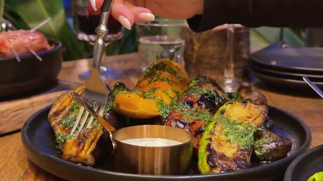 prick a piece of pumpkin with a fork Grilled vegetables platter