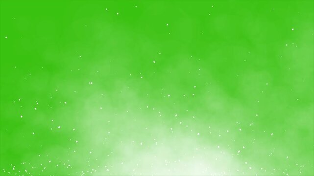  4k Smoke motion graphic effect on green screen background. Realistic snow fall on green screen 4k video. Dust particals flying against green background. 