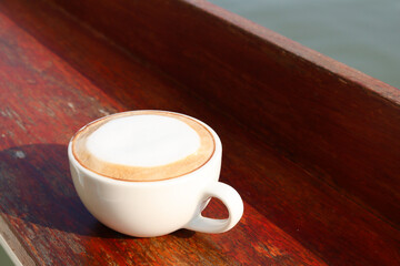Coffee latte milk foam on cup