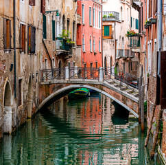 Venice Architecture: Bridge Over Canal And Old Houses