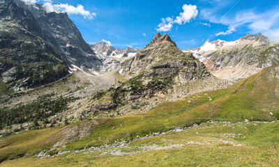 The Tour du Mont Blanc crosses France, Italy, and Switzerland, offering breathtaking views of glaciers, alpine passes, and the highest peak in the Alps.