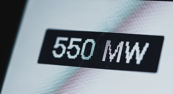 Digital screen displaying 550 MW, representing a large-scale power output or energy capacity measurement.