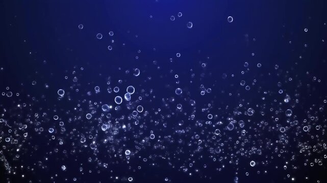 ディープネイビーのグラデーション背景に、極細マイクロバブルが静かに上昇する抽象映像です。
ほのかな発光拡散とシネマティックな浅い被写界深度が、洗練された奥行きを生み出します。
ハイライトは丁寧にコントロールされ、ラグジュアリーで上品なトーンを演出します。