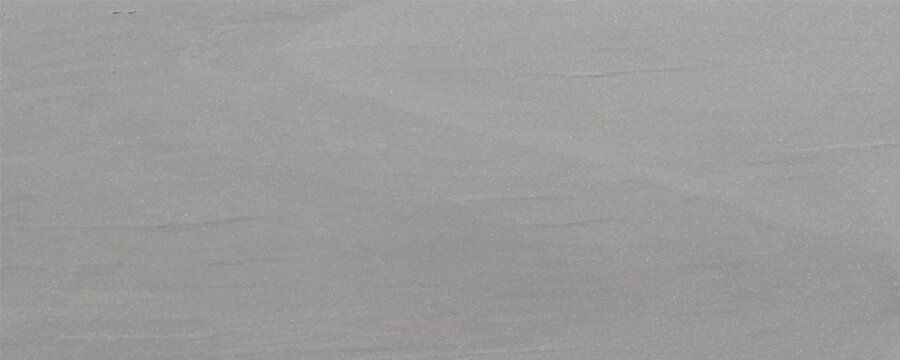 grayy rustic texture. Retro whitewashed surface of the old wall. Ancient structures. Grungy worn uneven painted plaster. Whiten the facade background