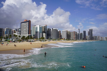 A very beautiful, wide sandy beach in northeastern Brazil, on the Atlantic Ocean in Fortaleza – Ceará, Brazil.. © guentermanaus