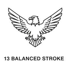 Obraz premium A black and white image of an eagle with outstretched wings