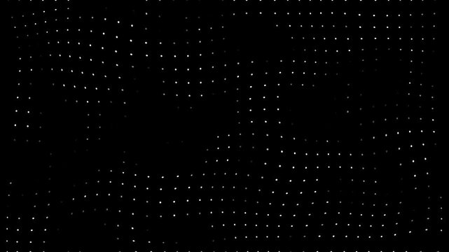Black background with kinetic white dots moving in a dynamic pattern creating a sense of energy and motion