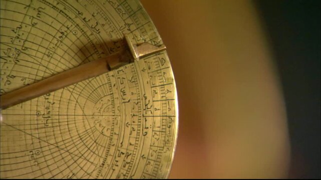astrolabe close up, astrolabe detail, historical reenactment, historical astronomy scene, medieval astronomer, man with astrolabe, historical scientist, observing sky, astronomy history, period drama 