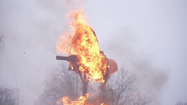 Slavic traditional burning of an effigy. An ancient pagan rite. The meeting of spring. High quality video
