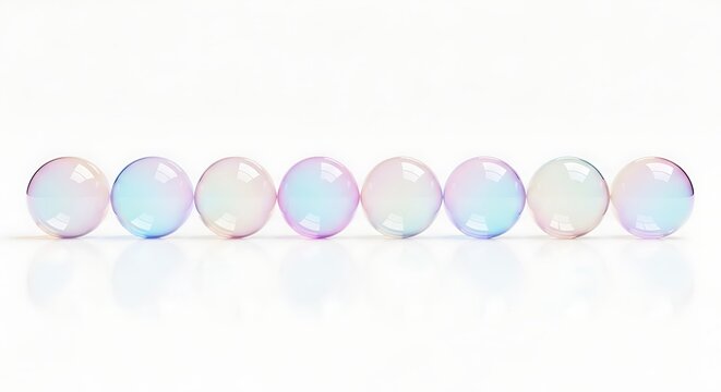 Seven iridescent opalite beads arranged horizontally on white surface with subtle reflections