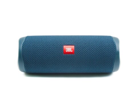 Loei, Thailand - September 18, 2023: Blue JBL Flip 5 portable Bluetooth speaker isolated on white background.