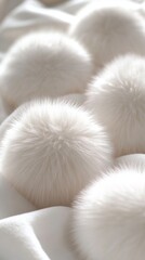 Close-up view of soft, fluffy pom-poms arranged together, showcasing intricate textures and vibrant colors, creating visually appealing abstract composition for creative projects. red background