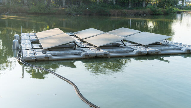Floating solar panels installed on a lake for renewable energy generation