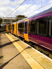 Obraz premium british rail suburban commuter passenger railway station. Great British Railways.