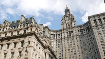 Obraz premium New York City Downtown Civic Center, United States of America. Manhattan municipal building 1914, old historic architecture. Government administration authority. Low angle view from Chambers street.