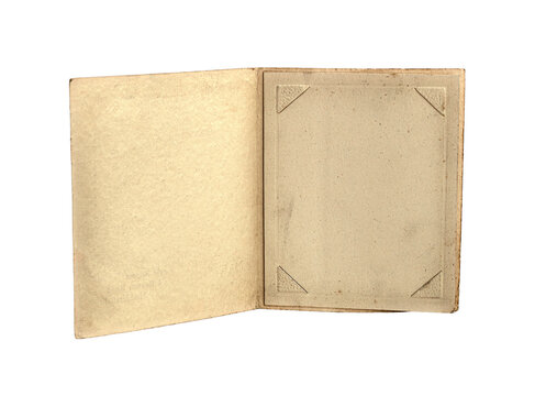 open vintage photo album page with blank photo mount and corner tabs isolated on white